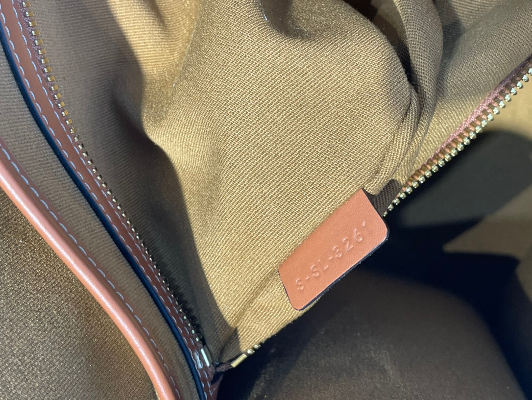 CELINE 25S HORIZONTAL CABAS 43MM IN BLACK TRIOMPHE CANVAS AND TAN BROWN CALFSKIN