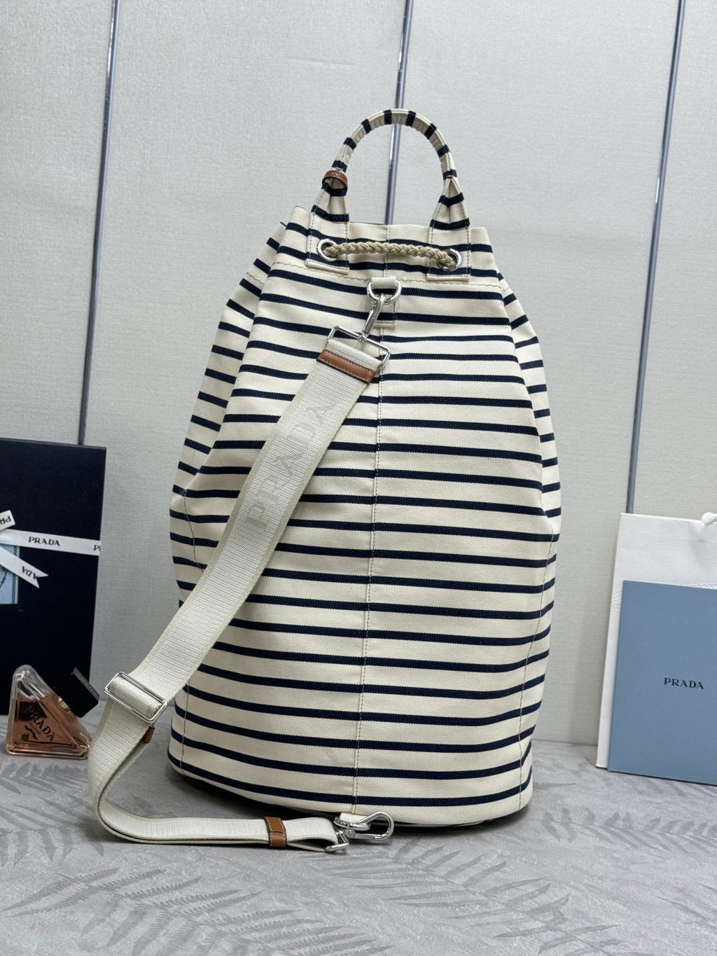PRADA 25S DRAWSTRING BACKPACK 55 IN HORIZONTAL STRIPES CANVAS SILVER HARDWARE