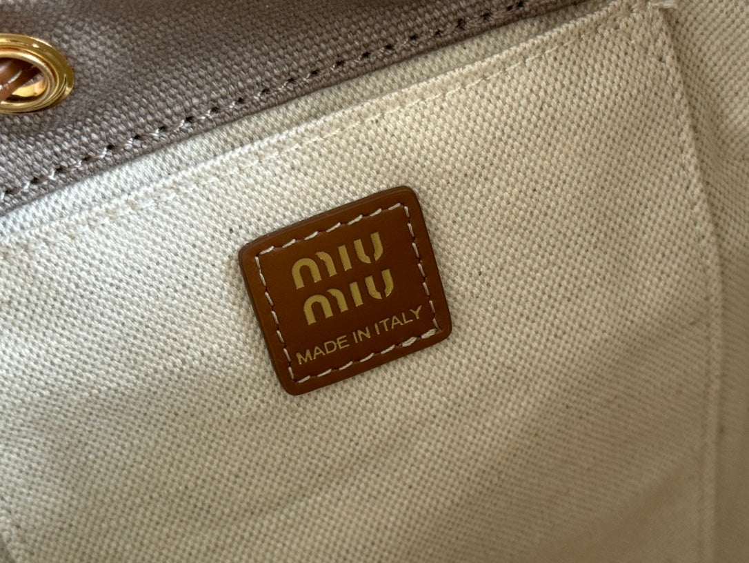 BACKPACK 22 IN GREY CANVAS BROWN CALFSKIN