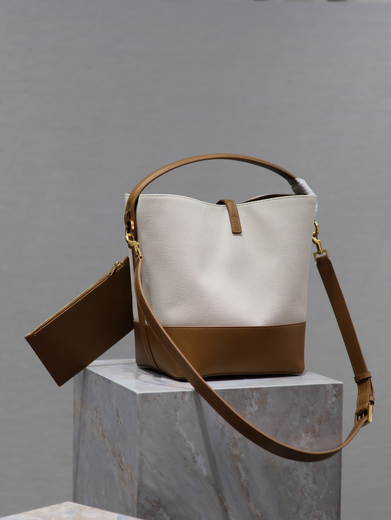 YSL 25S LE 5 À 7 BUCKET 26 IN CREAM BROWN CALFSKIN AND CANVAS GOLD HARDWARE